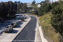 Caltrans trucks lining up preparing to pour new concrete pavement on northbound U.S. 101 Bayshore Freeway (Hospital Curve) in San Francisco on September 5, 2026.
