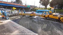 Caltrans crews using heavy equipment to pour new concrete pavement on northbound U.S. 101 Bayshore Freeway (Hospital Curve) in San Francisco on September 5, 2026.