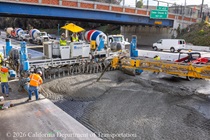 Caltrans crew pouring and screeding new concrete on northbound U.S. 101 Bayshore Freeway (Hospital Curve) in San Francisco on September 5, 2026.