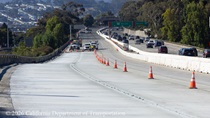 Cars traveling on southbound US-101 as Caltrans workers are finishing the newly poured concrete pavement on northbound U.S. 101 Bayshore Freeway (Hospital Curve) in San Francisco on September 6, 2026.