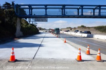 Cars traveling on southbound US-101 as Caltrans workers are finishing the newly poured concrete pavement on northbound U.S. 101 Bayshore Freeway (Hospital Curve) in San Francisco on September 6, 2026.
