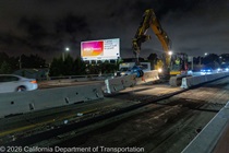 Crews work along U.S. 101 near Hospital Curve during a full highway closure for road rehabilitation in the city of San Francisco on the night of September 18, 2026.