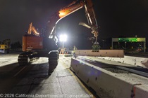 Crews work along U.S. 101 near Hospital Curve during a full highway closure for road rehabilitation in the city of San Francisco on the night of September 18, 2026.