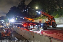 Crews work along U.S. 101 near Hospital Curve during a full highway closure for road rehabilitation in the city of San Francisco on the night of September 18, 2026.