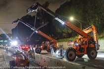 Crews work along U.S. 101 near Hospital Curve during a full highway closure for road rehabilitation in the city of San Francisco on the night of September 18, 2026.