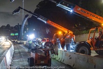 Crews work along U.S. 101 near Hospital Curve during a full highway closure for road rehabilitation in the city of San Francisco on the night of September 18, 2026.