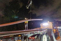 Crews work along U.S. 101 near Hospital Curve during a full highway closure for road rehabilitation in the city of San Francisco on the night of September 18, 2026.
