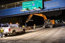 Crews work along U.S. 101 near Hospital Curve during a full highway closure for road rehabilitation in the city of San Francisco on the night of September 18, 2026.