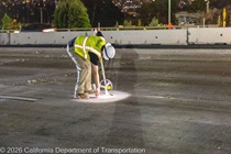 Crews work along U.S. 101 near Hospital Curve during a full highway closure for road rehabilitation in the city of San Francisco on the night of September 18, 2026.