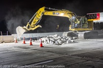 Crews work along U.S. 101 near Hospital Curve during a full highway closure for road rehabilitation in the city of San Francisco on the night of September 18, 2026.