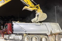 Crews work along U.S. 101 near Hospital Curve during a full highway closure for road rehabilitation in the city of San Francisco on the night of September 18, 2026.
