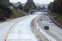 Traffic cones on the section of northbound US-101 near Hospital Curve in San Francisco closed for a roadway rehabilitation project. Southbound US-101 remains open to drivers.