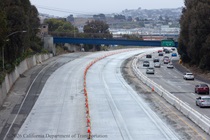 Traffic cones on the section of northbound US-101 near Hospital Curve in San Francisco closed for a roadway rehabilitation project. Southbound US-101 remains open to traffic.