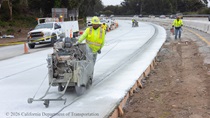 A Caltrans crew works on the new concrete on northbound US-101 near Hospital Curve in San Francisco on Sunday, September 20, 2026. Southbound US-101 remains open to traffic.