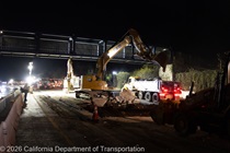 Heavy equipment is used to remove the old roadway materials on southbound US-101 during the night of October 16, 2026.
