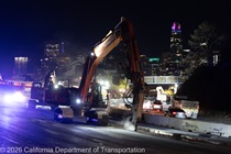 Heavy equipment is used to remove the old roadway material on southbound US-101 during the night of October 16, 2026.