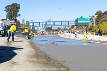 A crew smooths concrete during the roadway rehabilitation project on southbound US-101 near Vermont Street on Saturday, October 17, 2026.