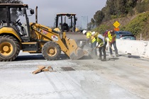 A crew performs work as part of the roadway rehabilitation project on southbound US-101 near Hospital Curve on Sunday, October 18, 2026.
