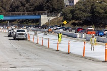Cones mark the new concrete installed as part of the roadway rehabilitation project on southbound US-101 near Hospital Curve on Sunday, October 18, 2026.
