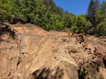 Photograph of slide damage repair project work zone on State Route 84 in San Mateo County. Picture taken on May 16, 2023.