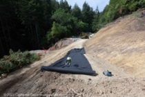 Photograph of work being done to repair storm damage on State Route 84 in San Mateo County. Picture taken on June 7, 2023.