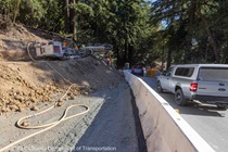 Picture of State Route 84 in San Mateo County on July 28, 2023. Roadway is open for one-way traffic control while Caltrans works on the other side of the barrier.