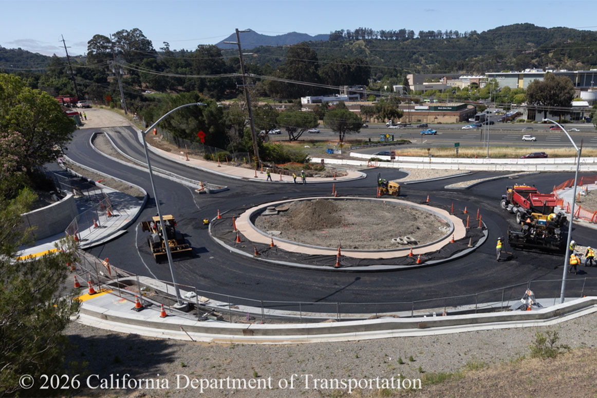 Caltrans crew working on the new roundabout project at Manuel T. Freitas Parkway/US-101 interchange.