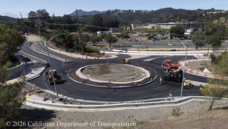 Caltrans crew working on the new roundabout project at Manuel T. Freitas Parkway/US-101 interchange.