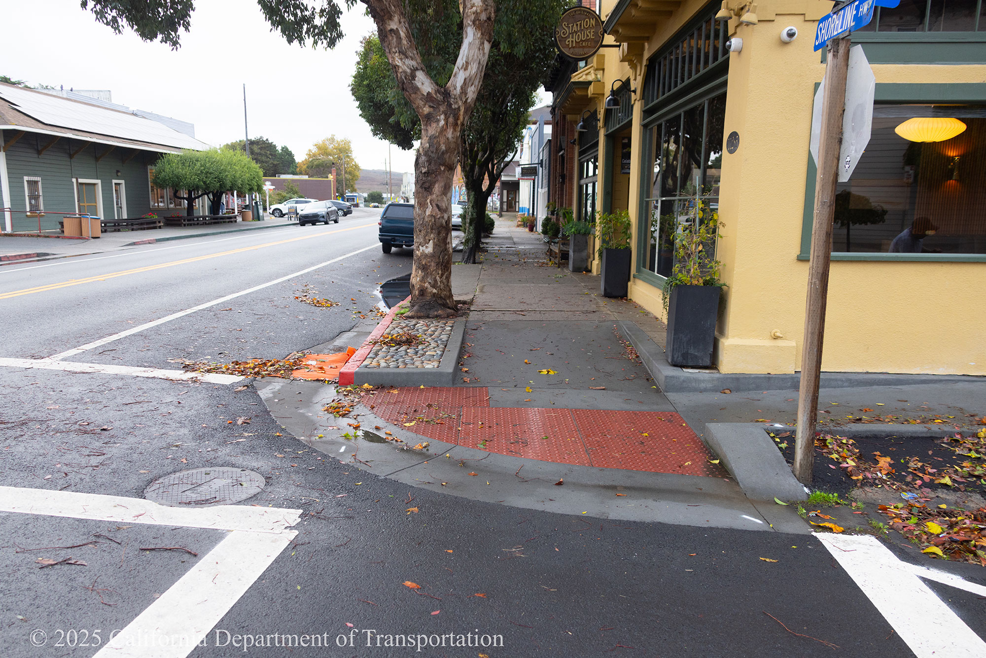 Rehabilitated curb ramp as part of the State Route 1 Capital Preventative Maintenance project. The project includes upgrades to existing  SR-1 infrastructure, including pavement rehabilitation, curb ramp upgrades in the communities of Point Reyes Station and Tomales, replacement of guardrails and crash cushions, upgrading of drainage inlets, replacement of aging culverts, and improvements to crosswalks and signage in Point Reyes Station and improvements to sidewalks in the town of Tomales