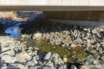 Huichica Creek flows under a bridge on State Route 121 in Napa County.