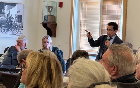 Caltrans attends town hall meeting in Tiburon to discuss SR-131 Capital Preventive Maintenance Project, where a speaker is addressing the community.