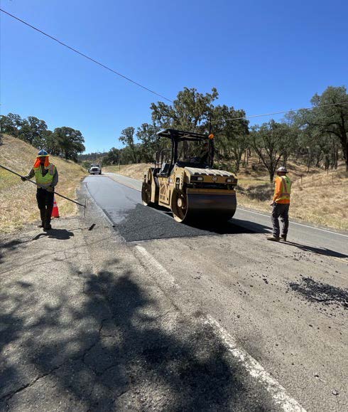 Caltrans using heavy equipment for resurfacing work on SR-128 between St. Helena and the City of Napa in the unincorporated portion of the county.