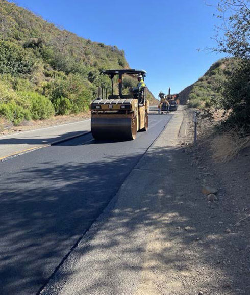 Caltrans using heavy equipment for resurfacing work on SR-128 between St. Helena and the City of Napa in the unincorporated portion of the county.