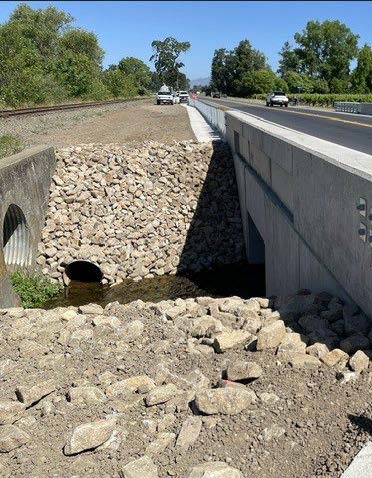 Cars traveling on the completed culvert and roadway replacement on State Route 29. 
