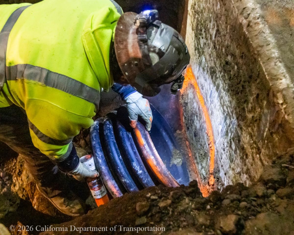 This construction crew member recently worked overnight with others to begin the complex process of rehabilitating the drainage system at the U.S. 101 Hospital Curve.
