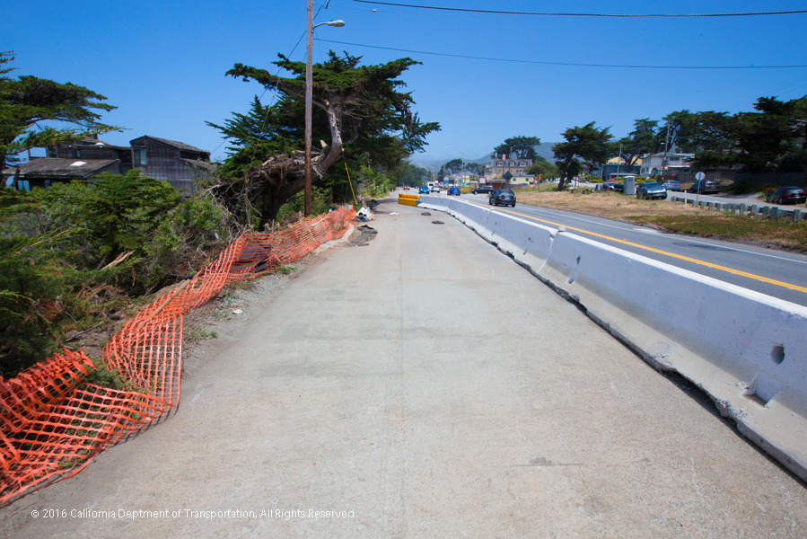 Caltrans working on State Route 1 Multi-Asset Roadway Rehabilitation Project, to protect construction crews and pedestrians from traffic while working in the roadway, Caltrans employs heavy concrete barriers known as "K-Rail".
