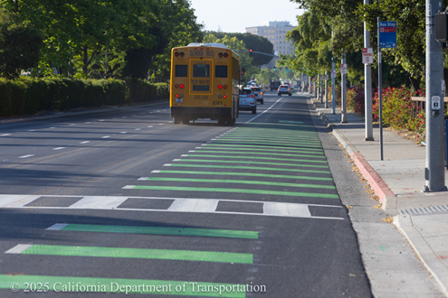 A school bus travels along State Route 82 next to the newly installed bike lane in Santa Clara County.