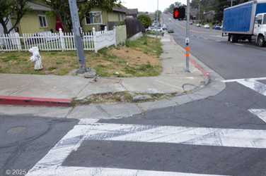 Photograph of a damaged curb on State Route 29 in Vallejo.