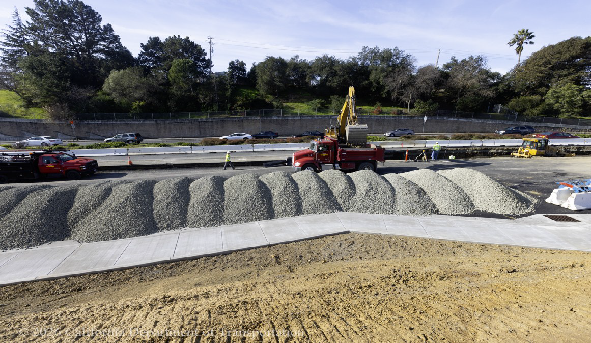 Piles of construction materials at the site of the divergent diamond project in Vallejo.