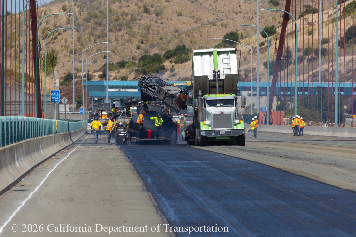 Caltrans working on the bridge deck rehabilitation adding new asphalt on to the Al Zampa Bridge.