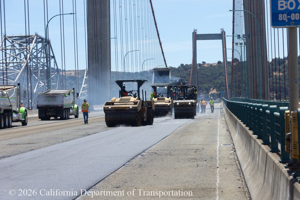 Caltrans Construction crews paving a lane on the Al Zampa Bridge.