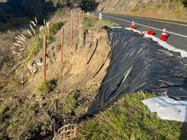 A slope alongside State Route 1 east of Bodega Bay is sliding.