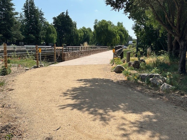 Granite pathways at ends of the bridge