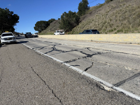 Crack sealing pavement on highway 1.