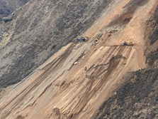 Photo showing workers on side of Regent's Slide conduction stabilization of the hill