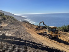 Photo showing two heavy equipment machines working on Regent's Slide.