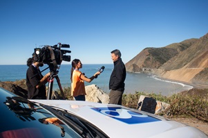 Media interviewing District Director Scott Eades