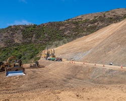 Caltrans in heavy equipment working on Regent's Slide