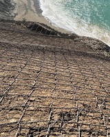 Photo showing material used to help hold dirt from shifting at project site.