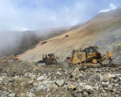 Photo of Caltrans staff and heavy equipment working at project site